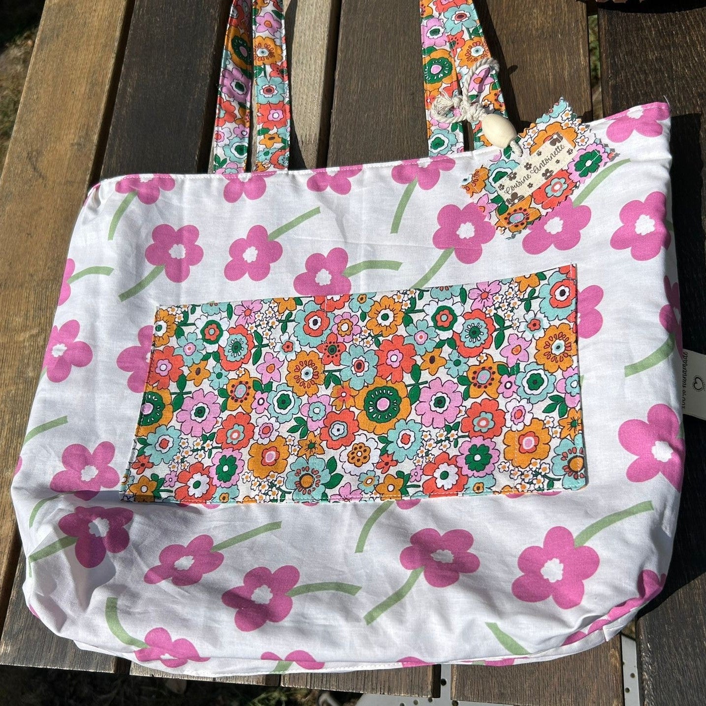 Sac cabas Barnabé de Chéribibi par Cousine Antoinette, en toile avec poignées en cuir, visible avec détails et texture.