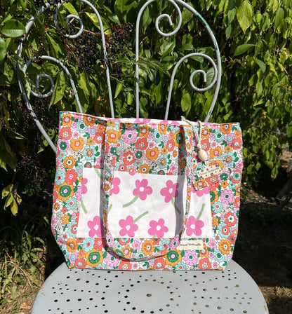 Sac cabas Barnabé de Chéribibi par Cousine Antoinette, en toile avec poignées en cuir et détails élégants visibles.