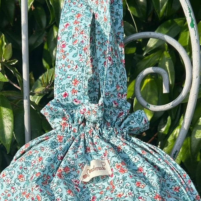 Sac pochon Oscar Flocon détail fermeture lien de serrage bouclette coton Liberty artisanal France
